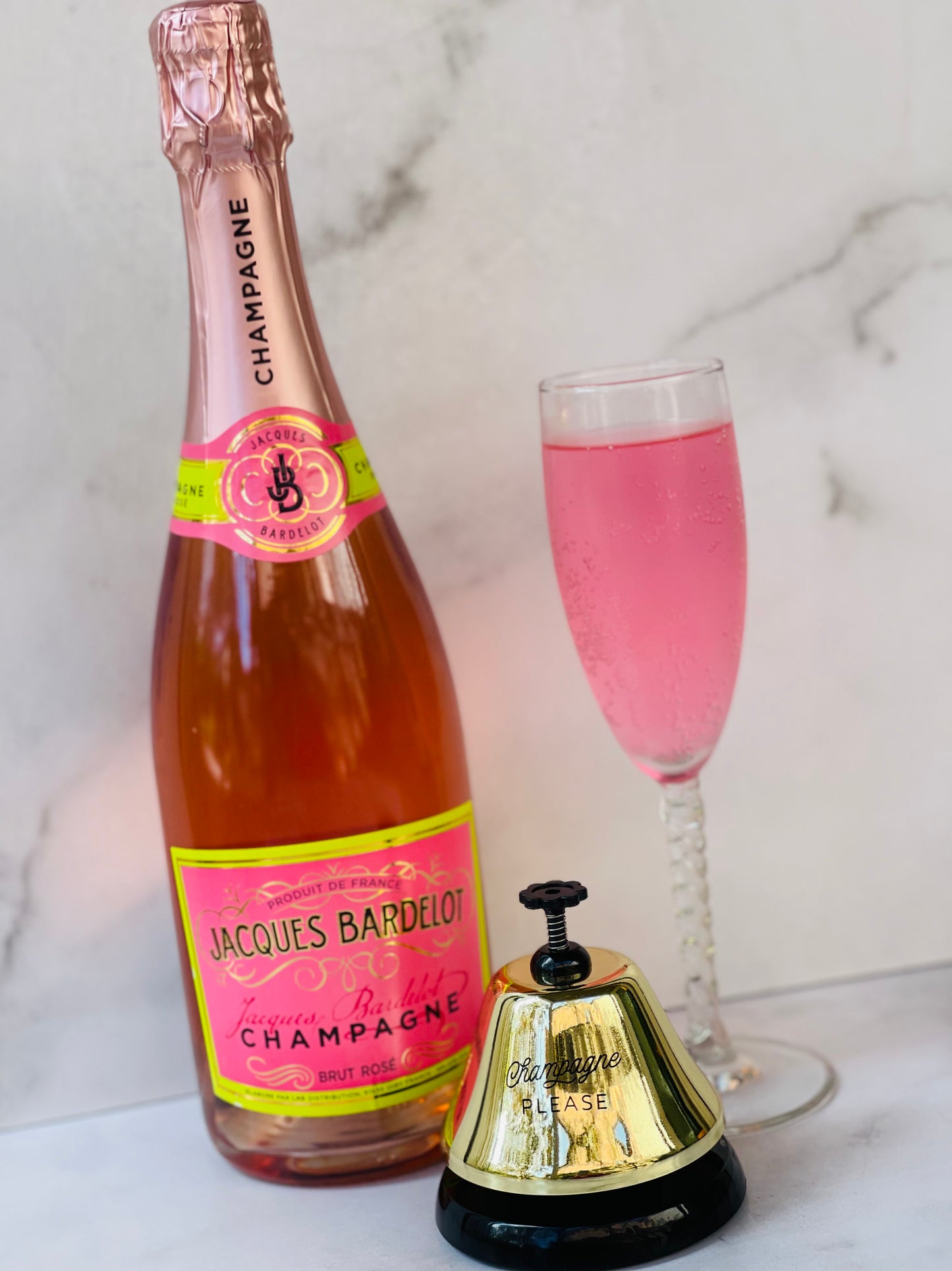 "Champagne Please" Bell